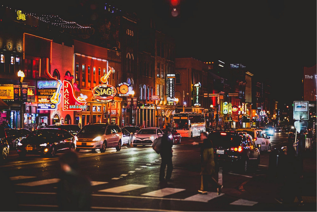 Neon lights along Broadway in downtown Nashville at night